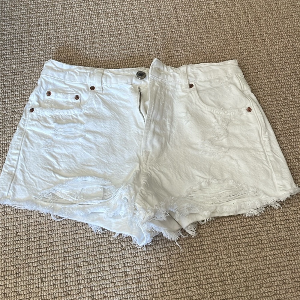 White ripped up Zara shorts